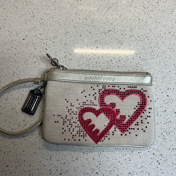 Coach Handbags - Coach Poppy Canvas Wristlet with Hang Tag